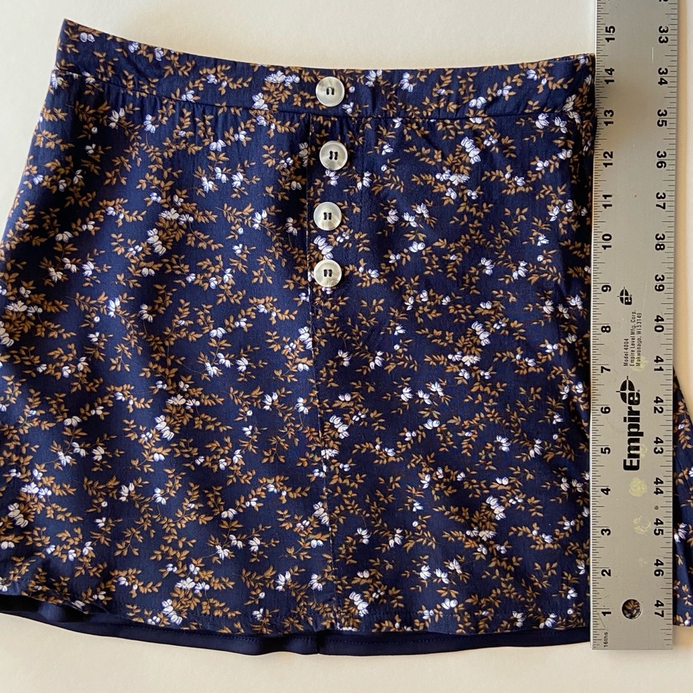 Tilly’s White Fawn Floral Navy Blue Skirt